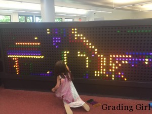 A life-size Lite-Brite wall!! (at Barrington Area Library)